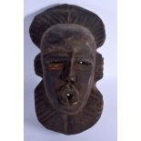 AN AFRICAN TRIBAL MASK. 35 cm x 15 cm.