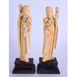 A PAIR OF 19TH CENTURY CHINESE CARVED IVORY IMMORTALS Qing. Ivory 14 cm high.