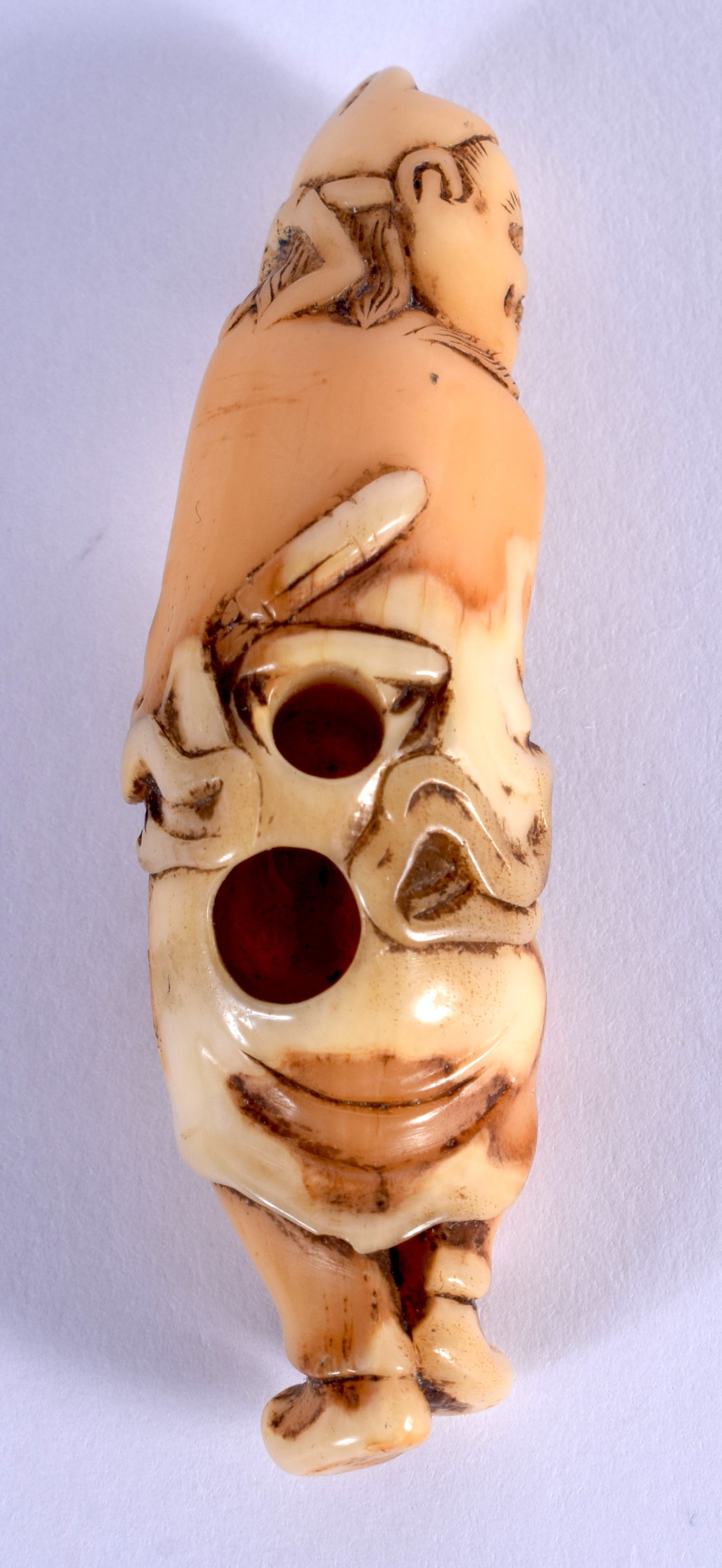 A LOVELY 18TH CENTURY JAPANESE MEIJI PERIOD CARVED IVORY NETSUKE modelled as a scowling male. 5 cm x - Image 3 of 3