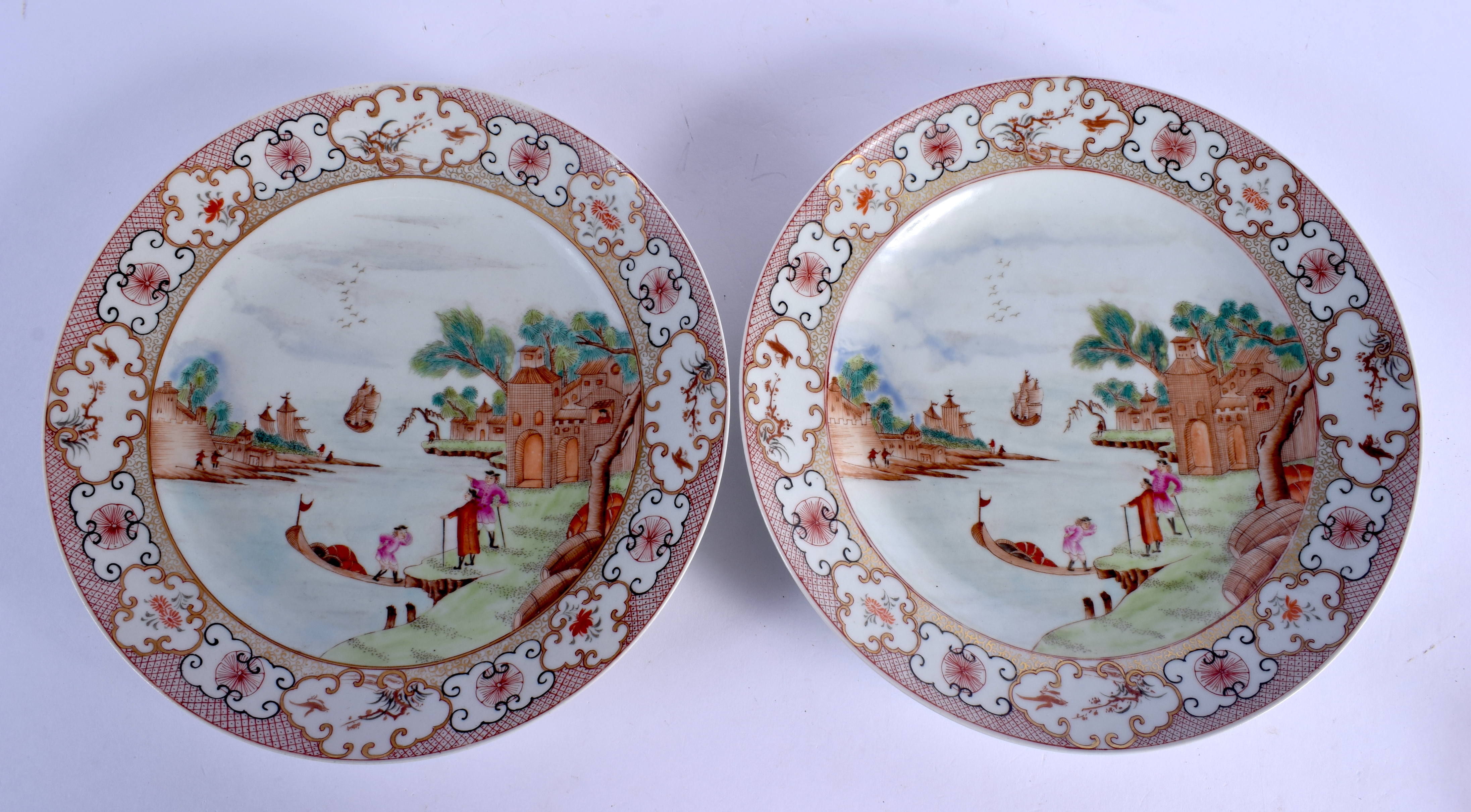 A PAIR OF CHINESE FAMILLE ROSE EXPORT PORCELAIN PLATES 20th Century, painted with European figures.