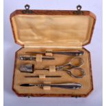 A BOXED SILVER MANICURE SET. 40 grams. Largest 11 cm long.