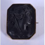 AN 18TH/19TH CENTURY EUROPEAN CARVED BLACK STONE CAMEO BROOCH. 7 grams. 2.5 cm x 2 cm.
