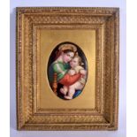 A LATE 19TH CENTURY GERMAN PORCELAIN PLAQUE probably by KPM, painted with the Madonna and Child. Pla