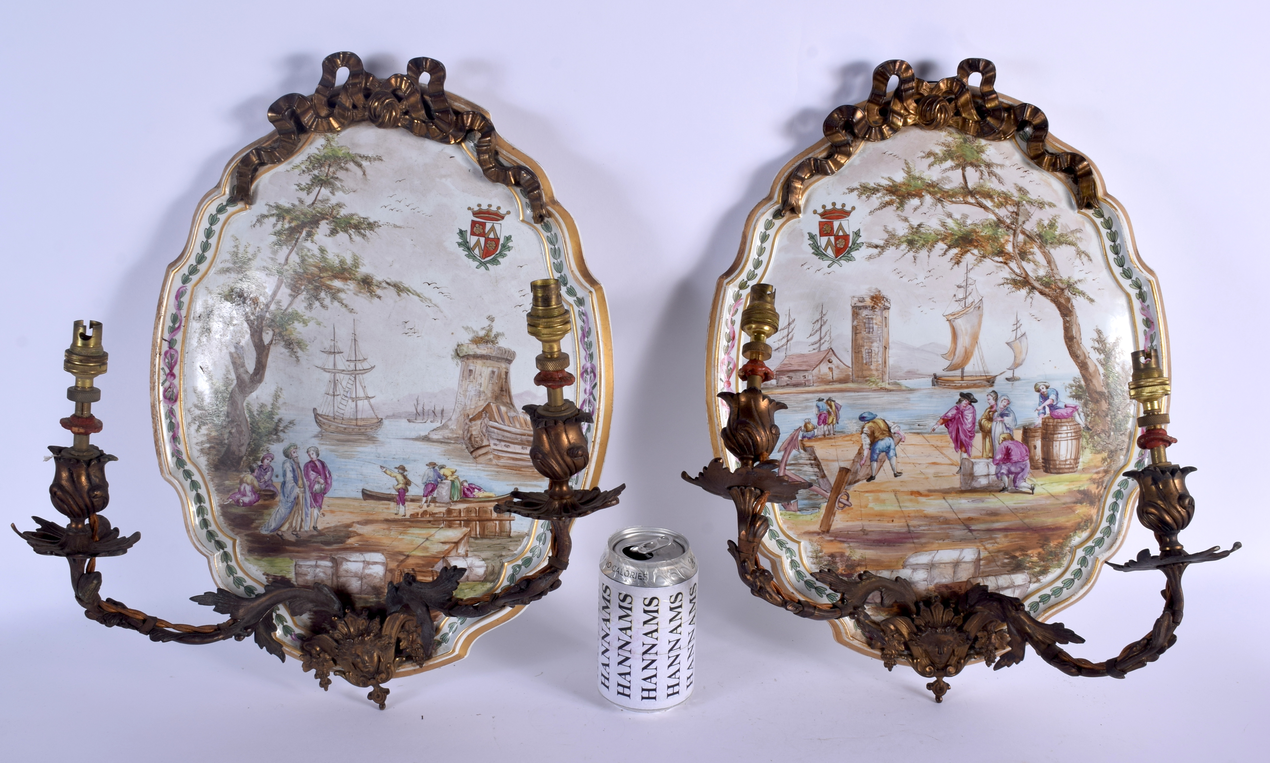 A LARGE PAIR OF 18TH/19TH CENTURY FRENCH LILLE POTTERY WALL PLAQUES painted with figures and seascap