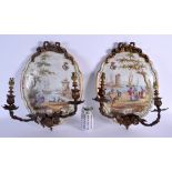 A LARGE PAIR OF 18TH/19TH CENTURY FRENCH LILLE POTTERY WALL PLAQUES painted with figures and seascap