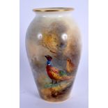 Royal Worcester amphora shaped vase painted with pheasants by James Stinton, signed, date code for 1