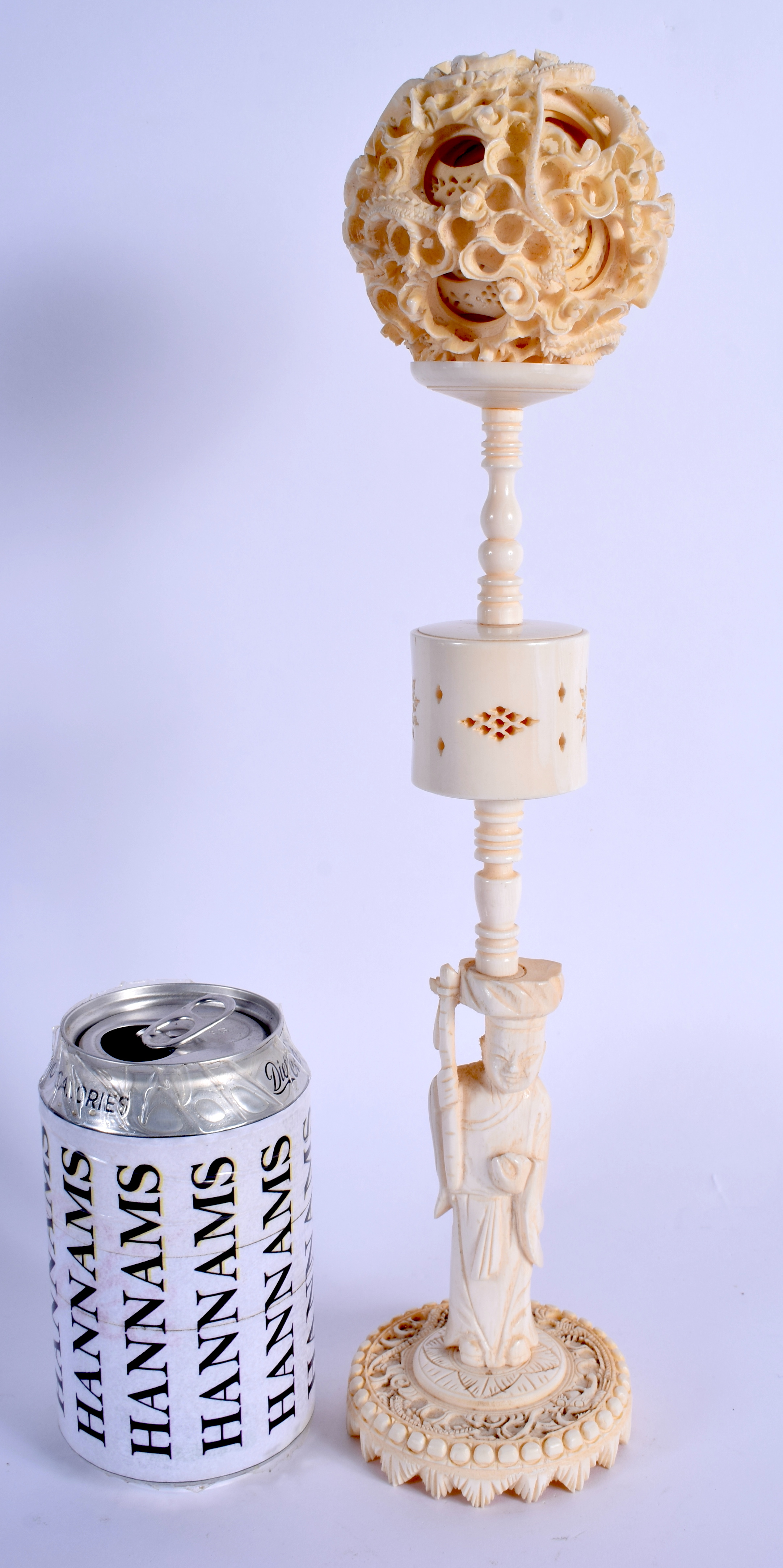 A 19TH CENTURY CHINESE CANTON BONE PUZZLE BALL ON STAND Qing. 30 cm high.