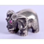 A SMALL CONTINENTAL FIGURE OF AN ELEPHANT. 16 grams. 1.5 cm wide.
