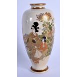 A LATE 19TH CENTURY JAPANESE MEIJI PERIOD SATSUMA VASE painted with geisha within landscape. 16 cm h
