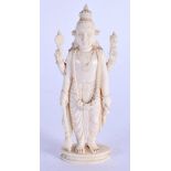 A 19TH CENTURY ANGLO INDIAN CARVED IVORY CARVED BUDDHISTIC DEITY. 11 cm high. 10 cm high.