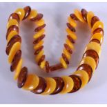 AN AMBER NECKLACE. 132 grams. 54 cm long.