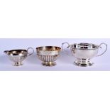 THREE ITEMS OF ENGLISH SILVER including a Victorian cream jug. 282 grams. (3)