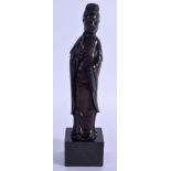 AN 18TH/19TH CENTURY CHINESE BRONZE FIGURE OF GUANYIN modelled in flowing robes. Bronze 14 cm high.