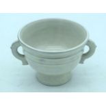A Chinese twin handled cup 11.5 x 8cm.