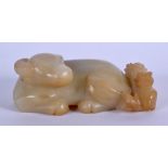 AN EARLY 20TH CENTURY CHINESE CARVED JADE FIGURE OF A BULLOCK Late Qing/Republic. 13 cm x 5 cm.