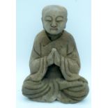 A wooden Buddha 23cm.