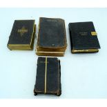 Three leather bound Bibles largest 18 cm (3).