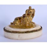 A 19TH CENTURY EUROPEAN GILT BRONZE FIGURE OF A DOG upon a marble base. 10 cm x 8 cm.