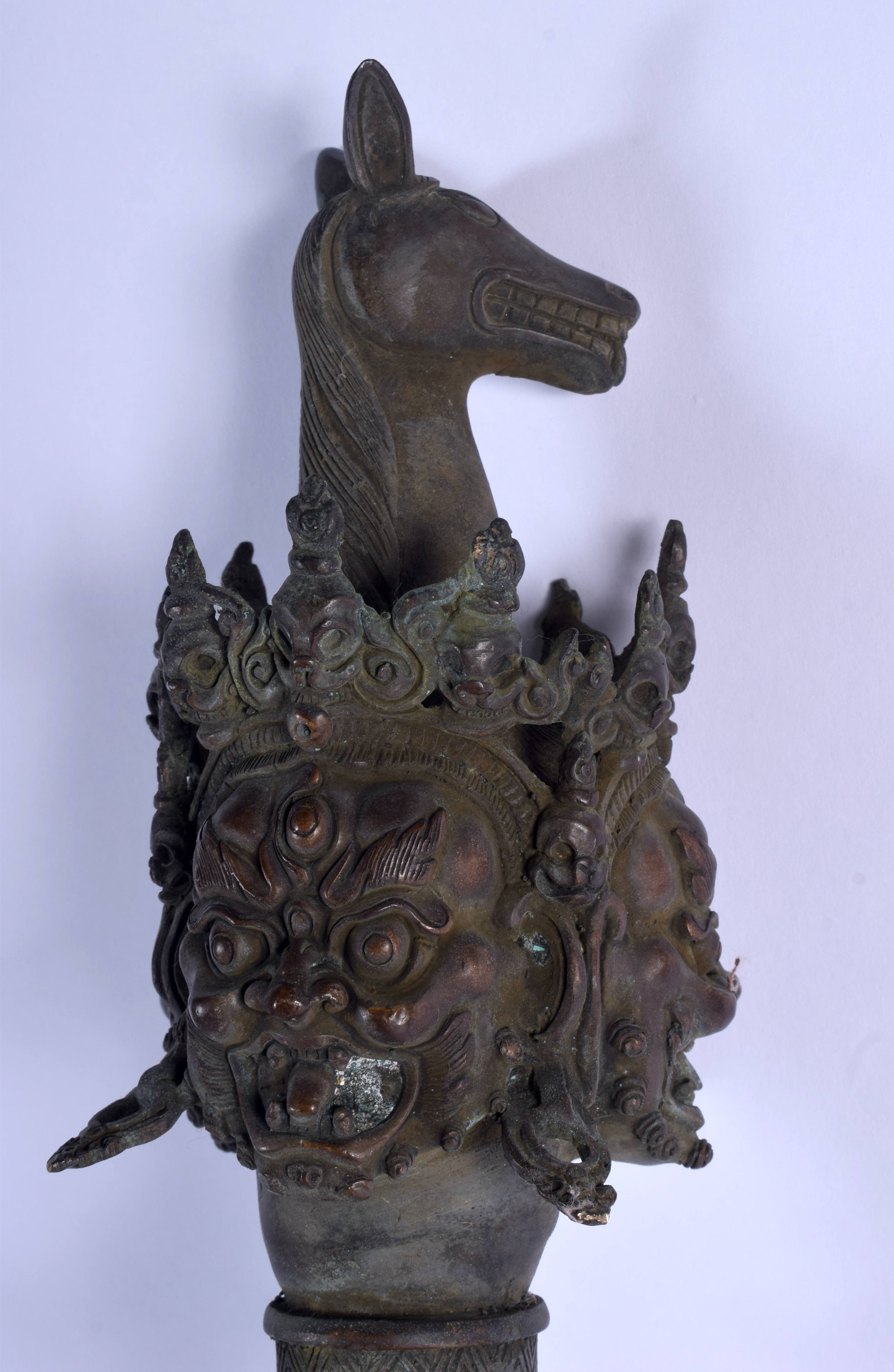 A LARGE CHINESE TIBETAN BRONZE PHURBA modelled with buddhistic mask heads. 60 cm long. - Image 2 of 5