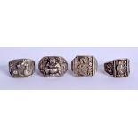 FOUR CHINESE WHITE METAL RINGS. (4)