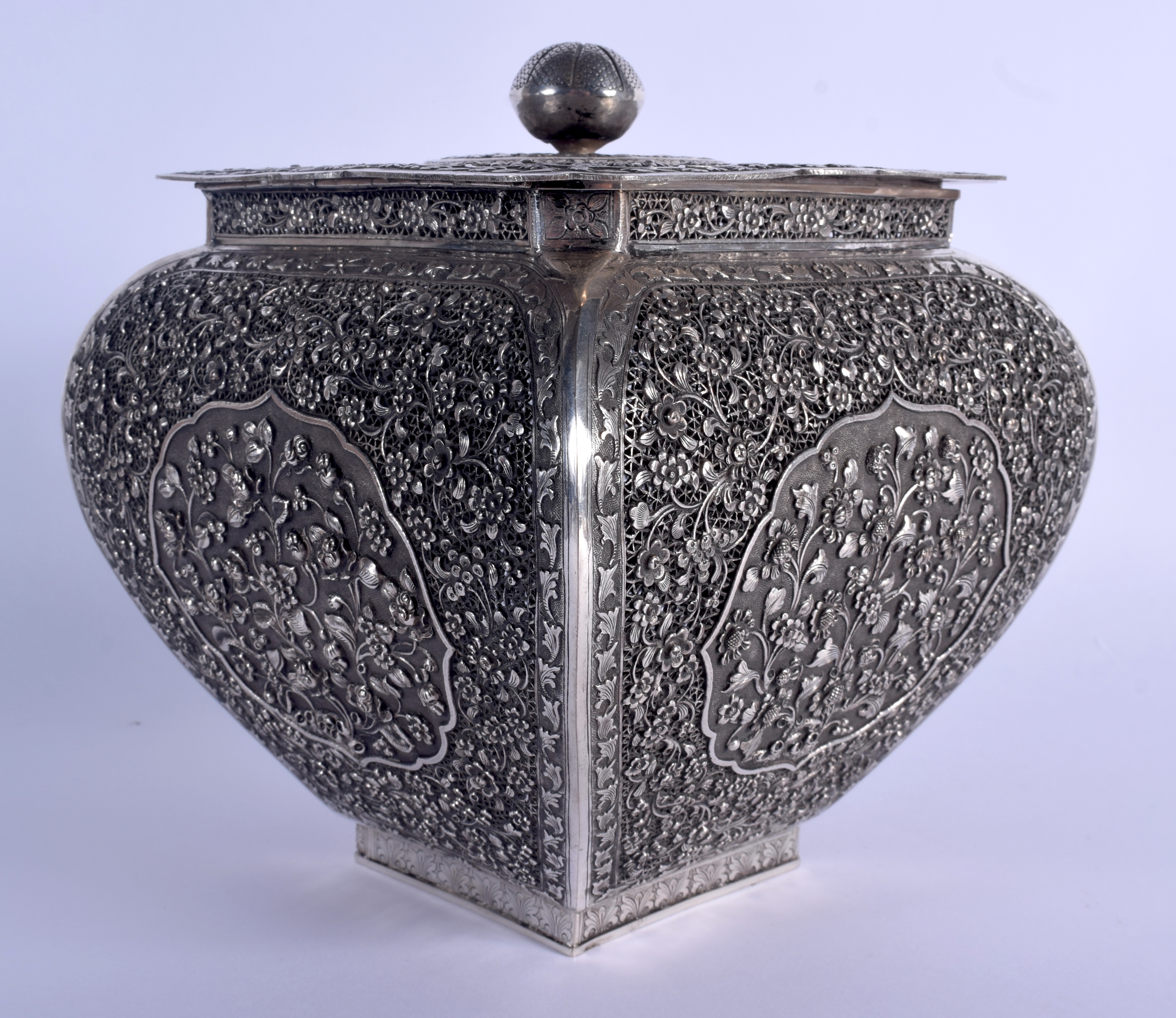 A 19TH CENTURY CHINESE TIBETAN STRAITS SILVER CENSER AND COVER decorated with foliage and vines. 970