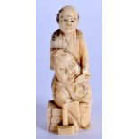 A 19TH CENTURY JAPANESE MEIJI PERIOD CARVED IVORY OKIMONO. 6 cm high.