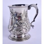 AN ANTIQUE SILVER MUG decorated with foliage. London 1828. 339 grams. 13 cm high.