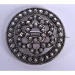 AN ANTIQUE BRIGHT CUT STEEL BROOCH. 35 grams. 5 cm diameter.