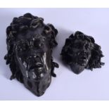 A PAIR OF CONTEMPORARY BRONZE MASK HEADS. Largest 18 cm x 11 cm.