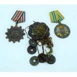 Two Chinese medals and a 19th Century coin medallion.(3)
