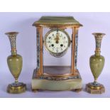 AN EARLY 20TH CENTURY FRENCH CHAMPLEVE ENAMEL AND ONYX CLOCK GARNITURE decorated with foliage and vi