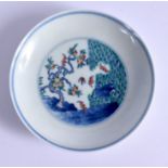A 19TH CENTURY CHINESE PORCELAIN CIRCULAR DOUCAI DISH Late Qing, bearing Yongzheng porcelain marks.