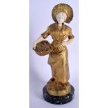 Henryk Kossowski (1855-1921) Bronze and Ivory lady, modelled carrying fish. Bronze 25 cm high.