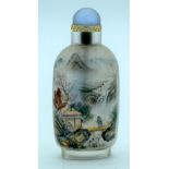A Chinese glass snuff bottle reverse painted with a landscape scene 10cm.