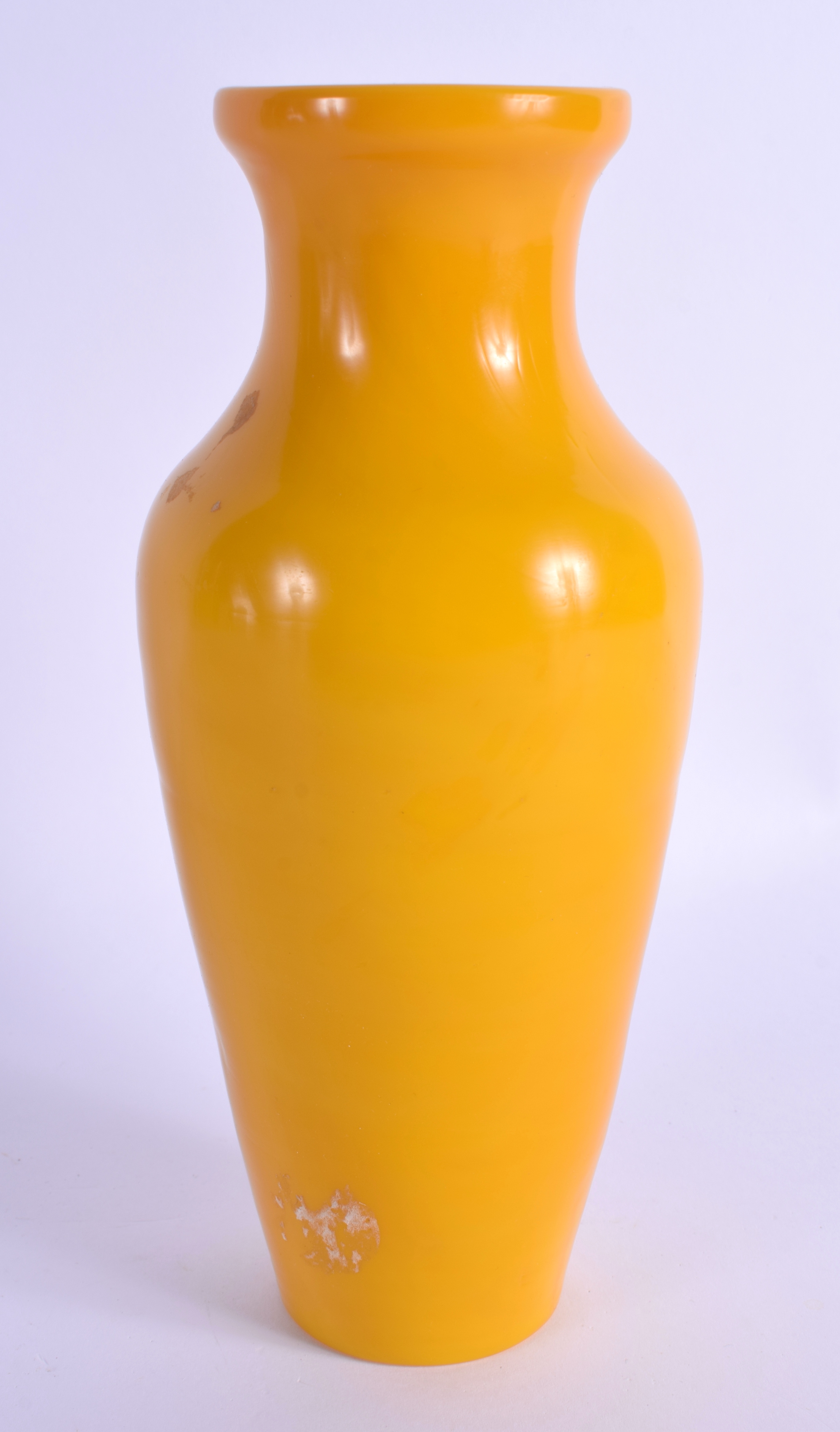 A 19TH CENTURY CHINESE PEKING GLASS TAPERING VASE Qing, of plain slender form. 21.5 cm high.