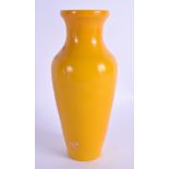 A 19TH CENTURY CHINESE PEKING GLASS TAPERING VASE Qing, of plain slender form. 21.5 cm high.
