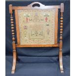 A Sampler fitted into a fire screen possibly Edwardian 39 x 39 cm.
