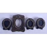 FOUR SMALL SILVER PHOTOGRAPH FRAMES. London 1988 and others. 175 grams overall. Largest 12 cm x 9 cm