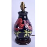 A MOORCROFT PORCELAIN LAMP. Porcelain 16.5 cm high.