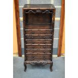 A RARE 19TH CENTURY CHINESE CARVED HONGMU HARDWOOD DISPLAY CABINET with six drawers and floral friez