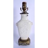 A 19TH CENTURY CHINESE BLANC DE CHINE PORCELAIN VASE Qing, converted to a lamp. Vase 24 cm high.