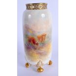 Royal Worcester vase on four ball feet painted with Highland Cattle by Harry Stinton, signed, date c