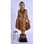 AN EARLY 20TH CENTURY SOUTH EAST ASIAN THAI GILTWOOD BUDDHA lacquered and jewelled. 44 cm high.