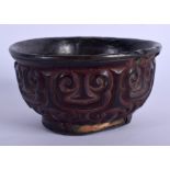 A RARE 17TH CENTURY CHINESE CARVED RED TIXI LACQUER BOWL Ming, carved with motifs. 9.5 cm wide. Note