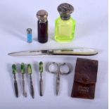 AN ART DECO GOLD AND ENAMEL PROPELLING PENCIL together with a silver bottle etc. (5)