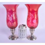 A PAIR OF VINTAGE SILVER MOUNTED CRANBERRY GLASS VASES. 30 cm high