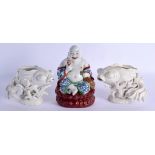 A PAIR OF EARLY 20TH CENTURY CHINESE BLANC DE CHINE PORCELAIN FISH together with a porcelain buddha.