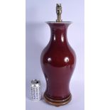 A 19TH CENTURY CHINESE FLAMBE SANG DU BOEUF VASE Qing, converted to a lamp. Porcelain 41 cm x 16 cm.