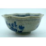 A blue and white Chinese bowl with Guiguzi xiashan pattern .
