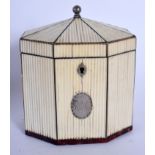 A GEORGE III CARVED IVORY AND TORTOISESHELL TEA CADDY with silver mounts. 13 cm x 10 cm.